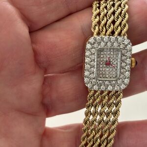 SOLD!!!

Vintage 14K Yellow Gold & Diamond Watch, 37.48 Grams. Good Timekeeper